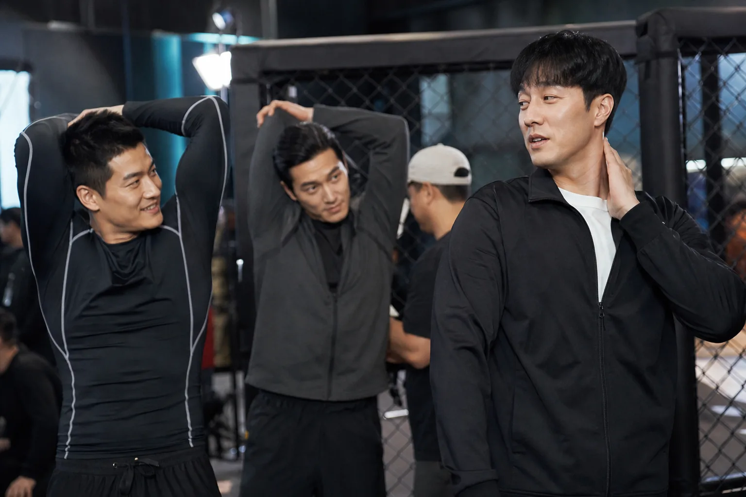 Korean drama production team reviewing a completed action scene
