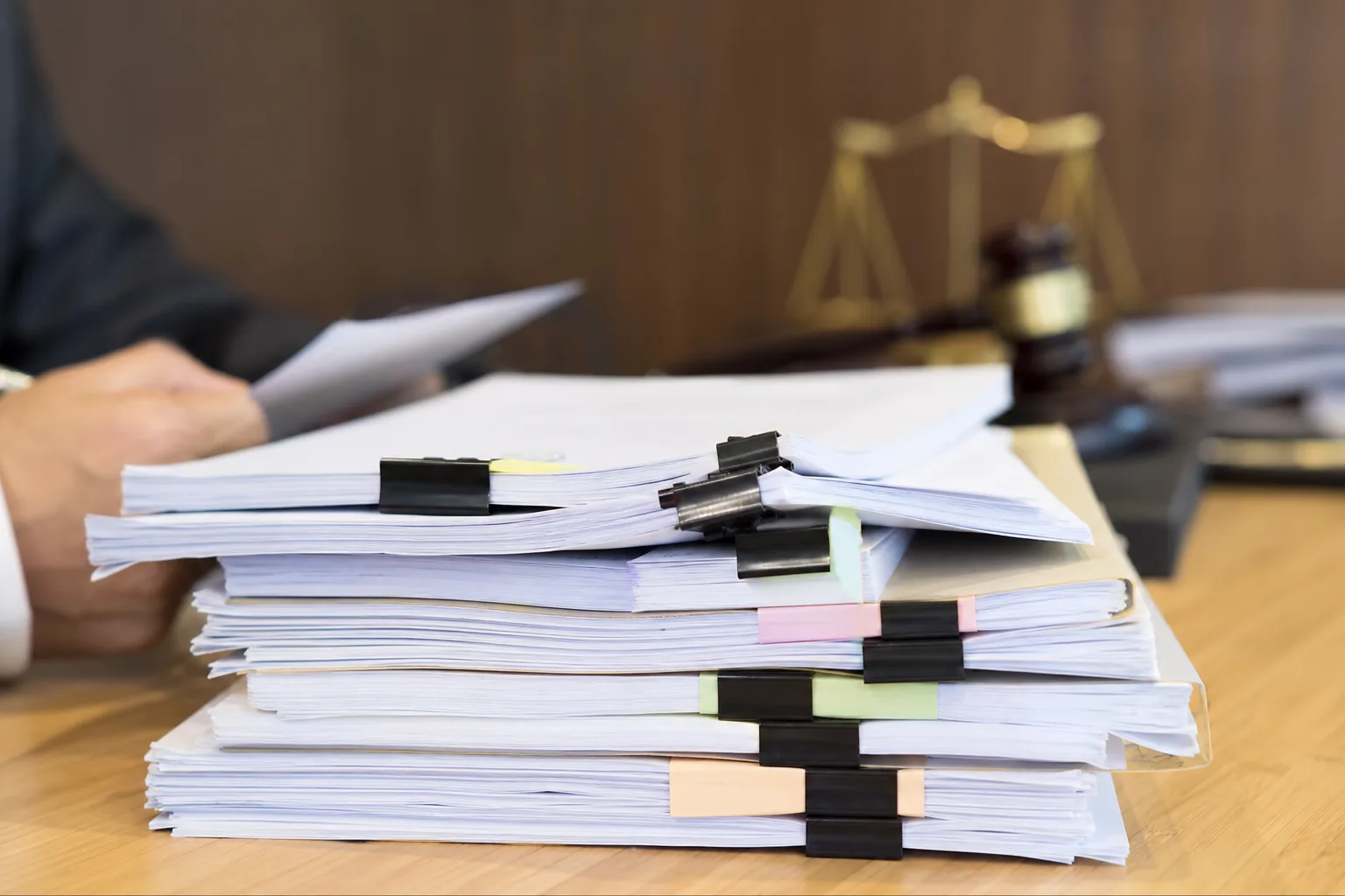 Legal papers and a press microphone illustrating agency statement in Korean entertainment dispute