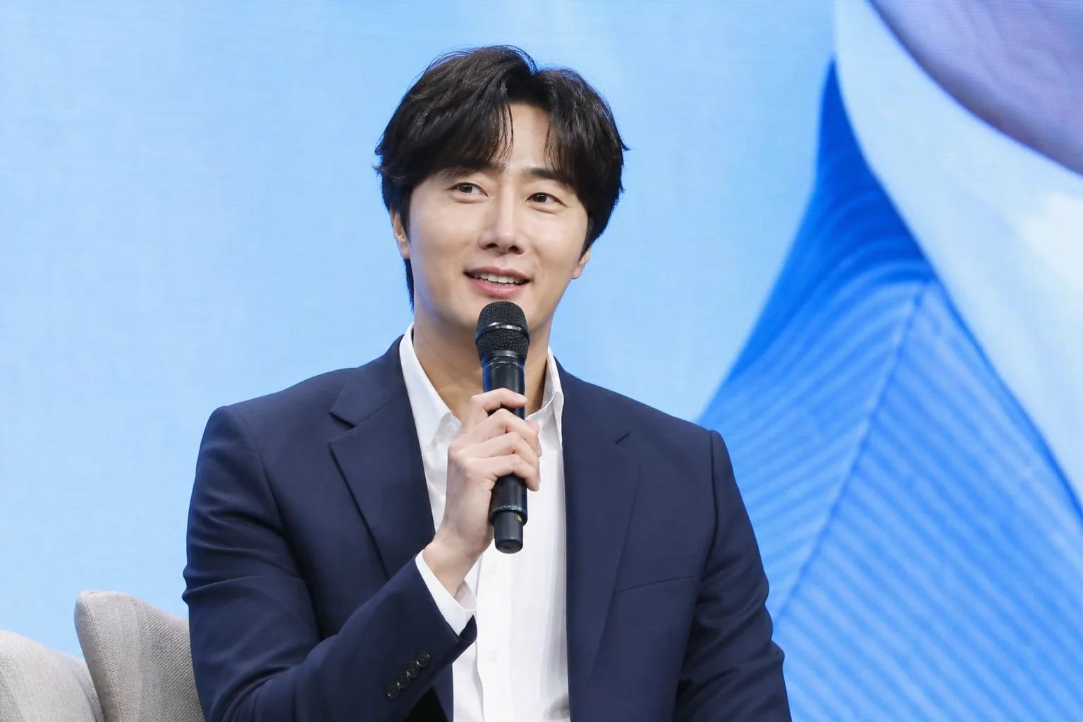 Editorial image representing a Korean drama actor connecting with fans worldwide
