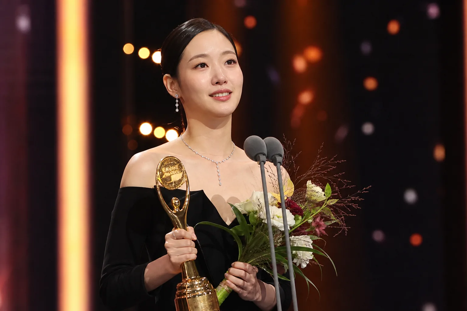Korean actress receiving a major television award on stage