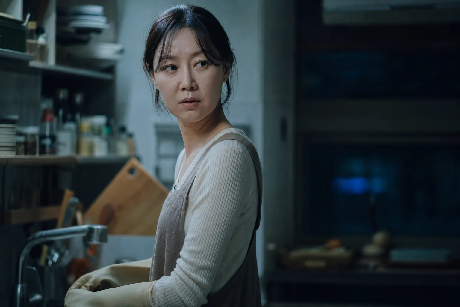 Korean suspense drama scene with a working mother character