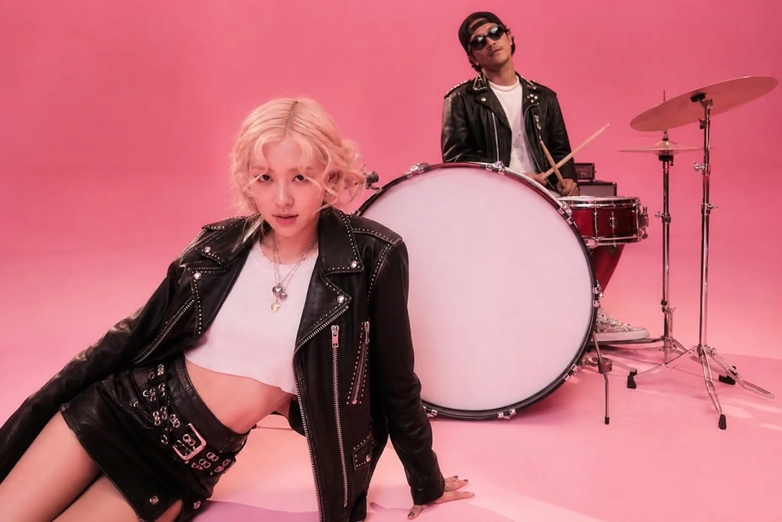 Stylized editorial scene of a global music video audience watching on multiple screens
