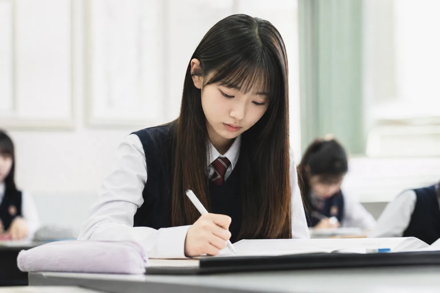Editorial image of a supportive school community and a young K-pop performer