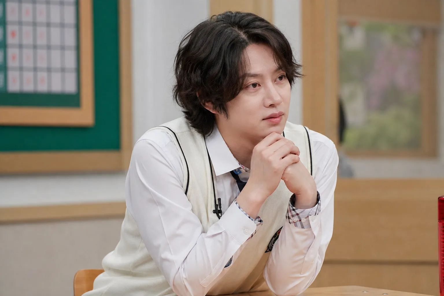 Performer preparing backstage before a Korean television variety show recording