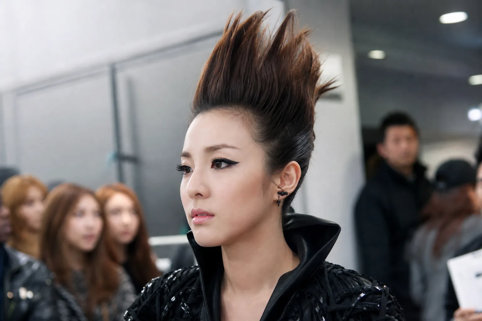 Editorial image of a stylized K-pop dressing room before a music show performance