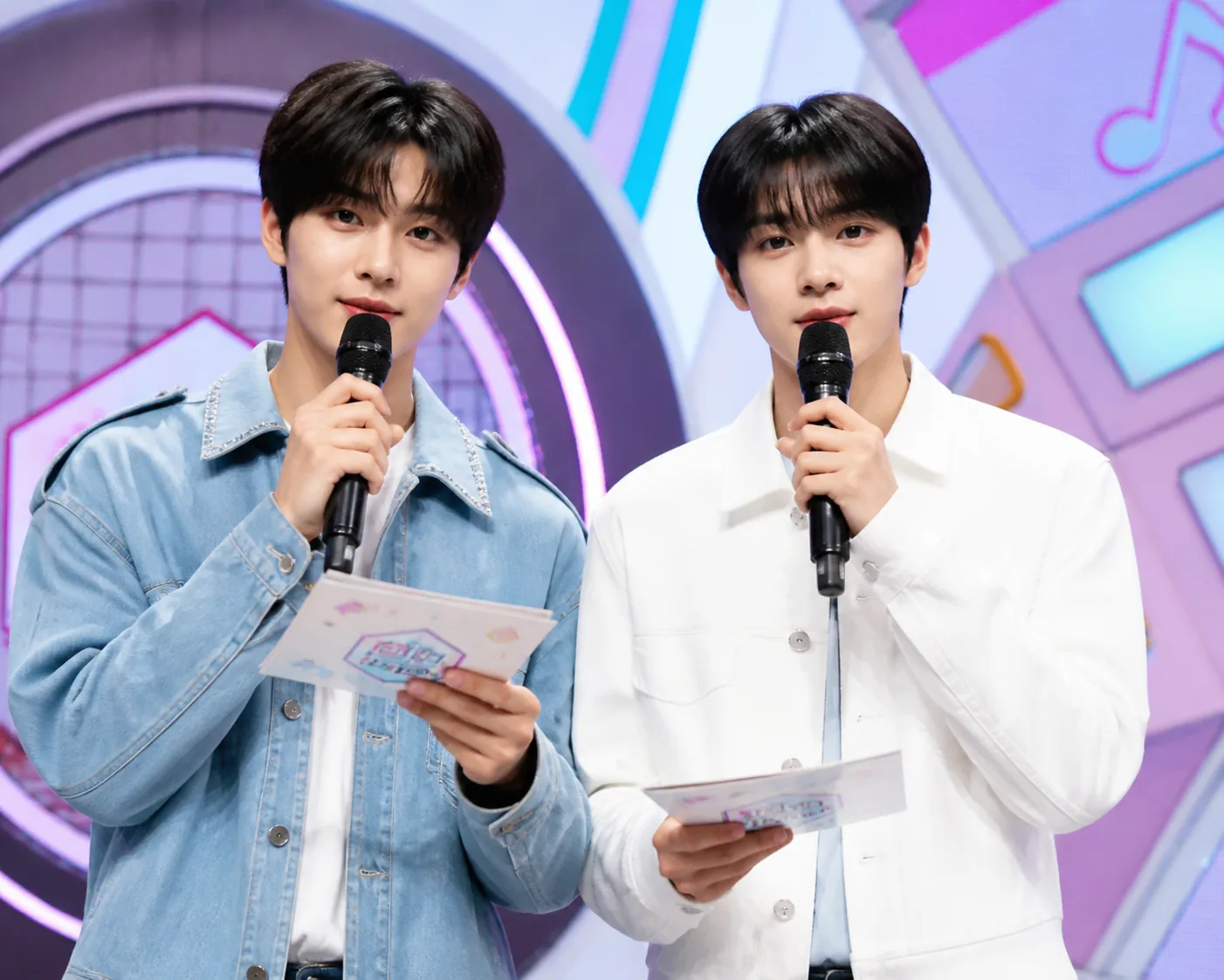 K-pop music show hosts preparing backstage before a live broadcast