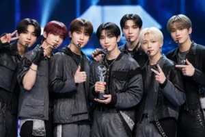 K-pop music show trophy on a brightly lit stage