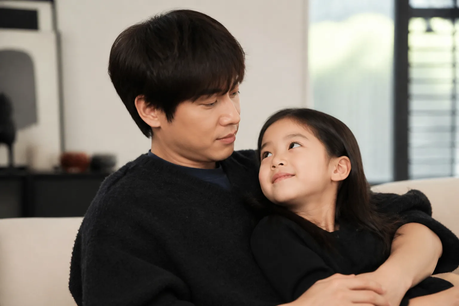Warm editorial image representing a father's hope that his daughter is cherished