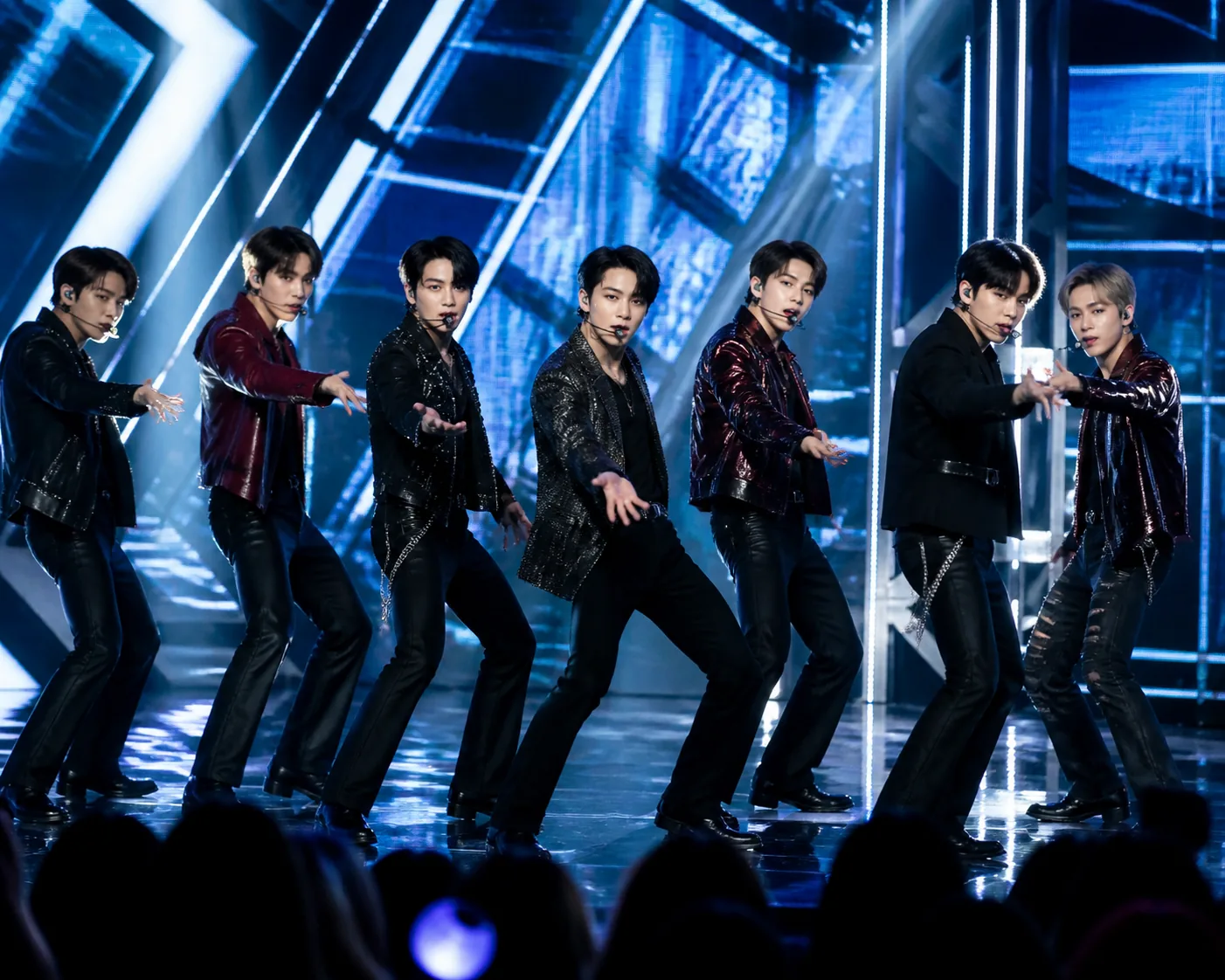 K-pop performers on a modern arena stage