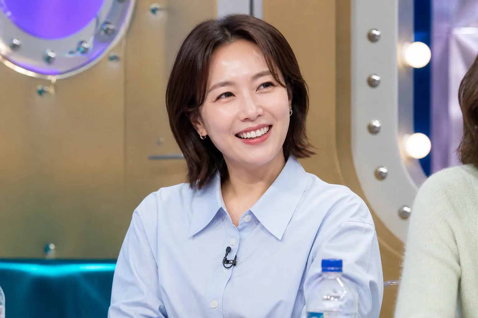 Warm editorial scene representing a private relationship discussed on a Korean web variety show