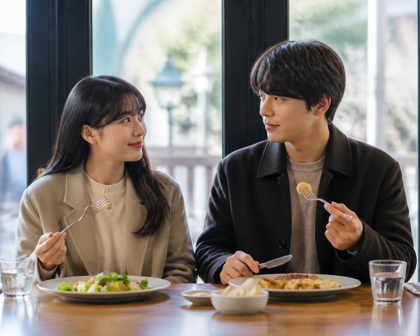 Editorial scene of a Korean drama couple posing with an arcade prize