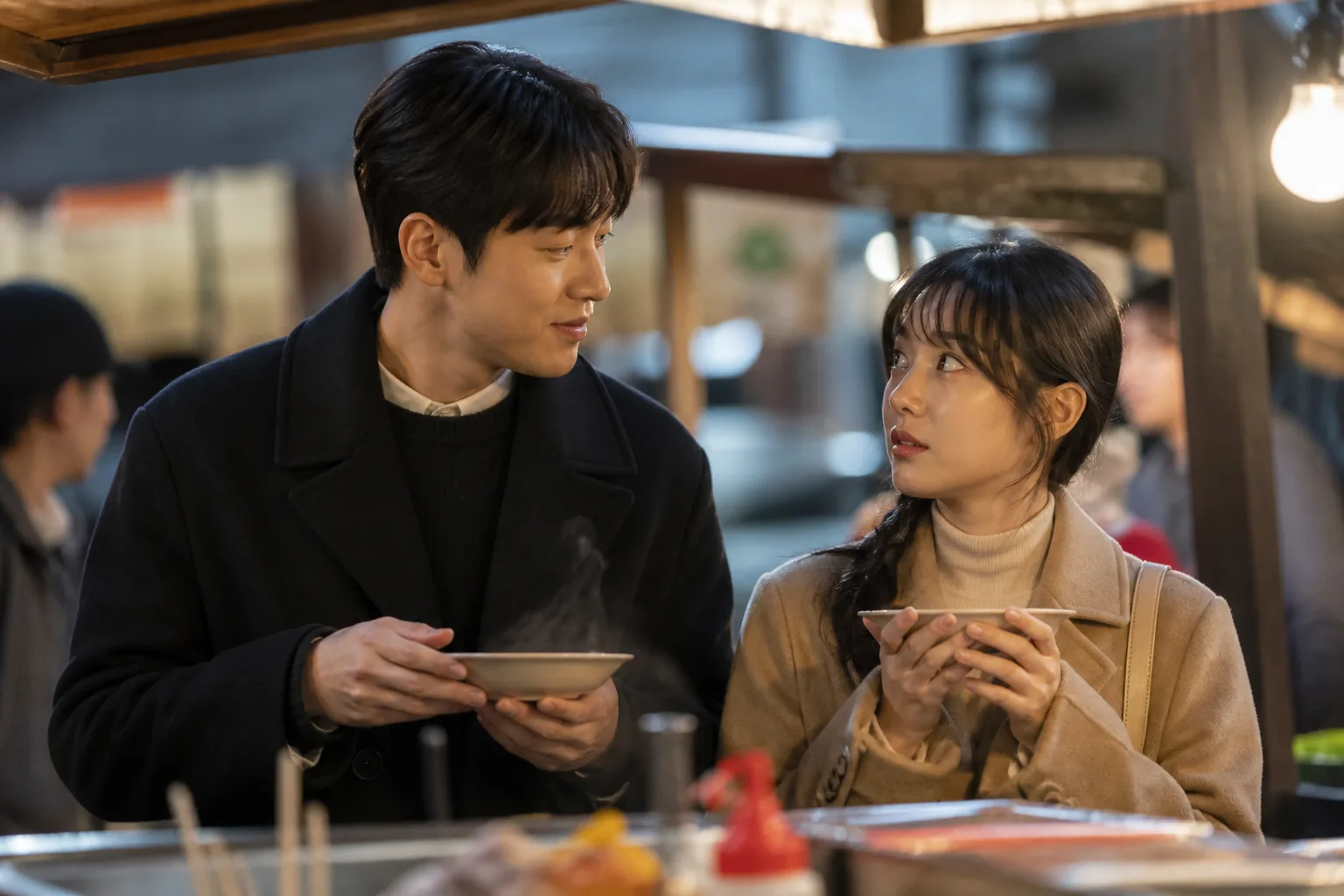 Editorial visual of a warm Korean restaurant drama scene