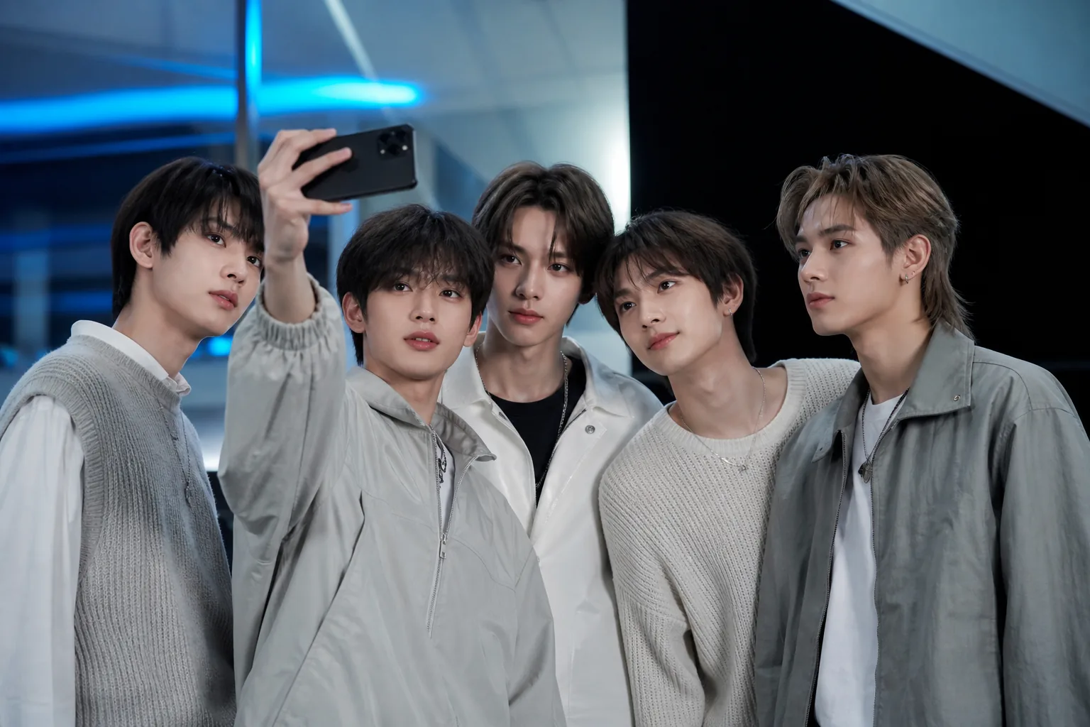 Fans engaging with K-pop posts on smartphones