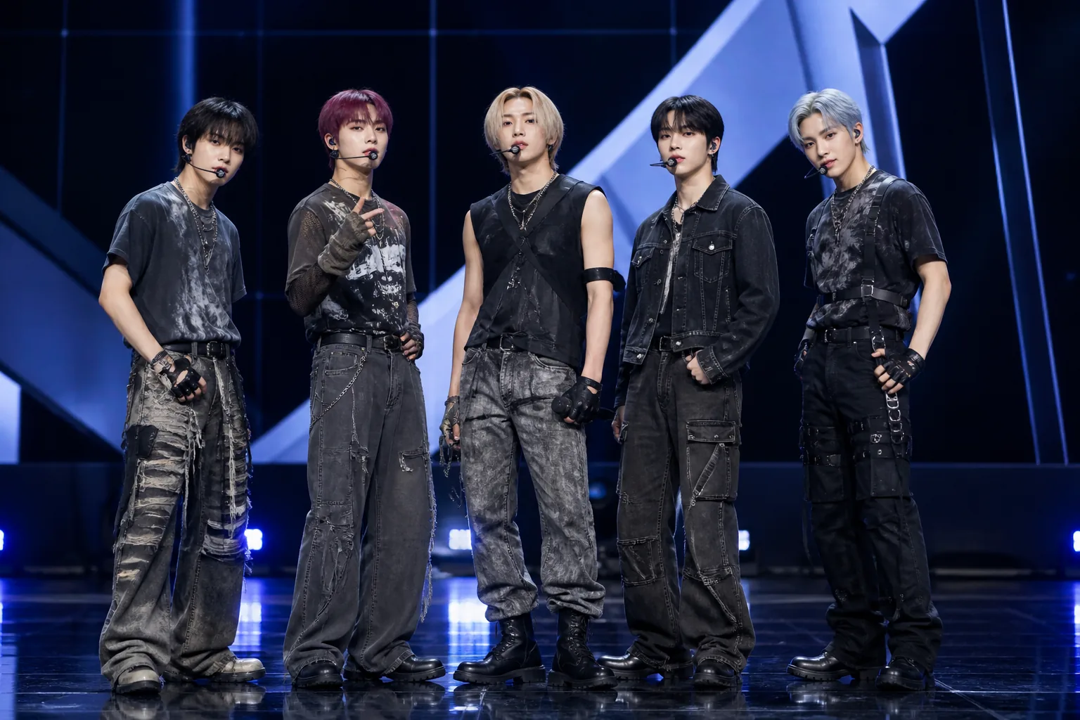 Five performers preparing for an adjusted K-pop event stage in Los Angeles