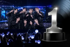 K-pop concert stage representing Stray Kids' ninth Billboard 200 number one