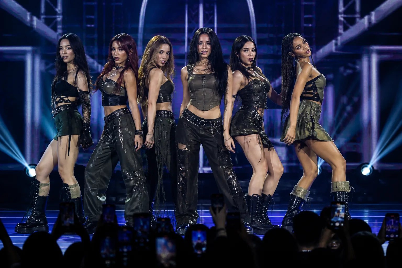 Girl group advancing upward through illuminated album chart positions