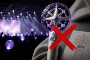Generic concert light stick glowing in a dark K-pop venue