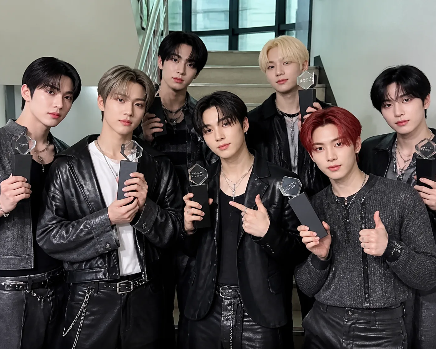 Five trophies representing a full week of Korean music show wins