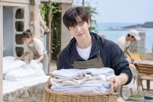 Four cast members running an unconventional island guesthouse for a Korean variety show