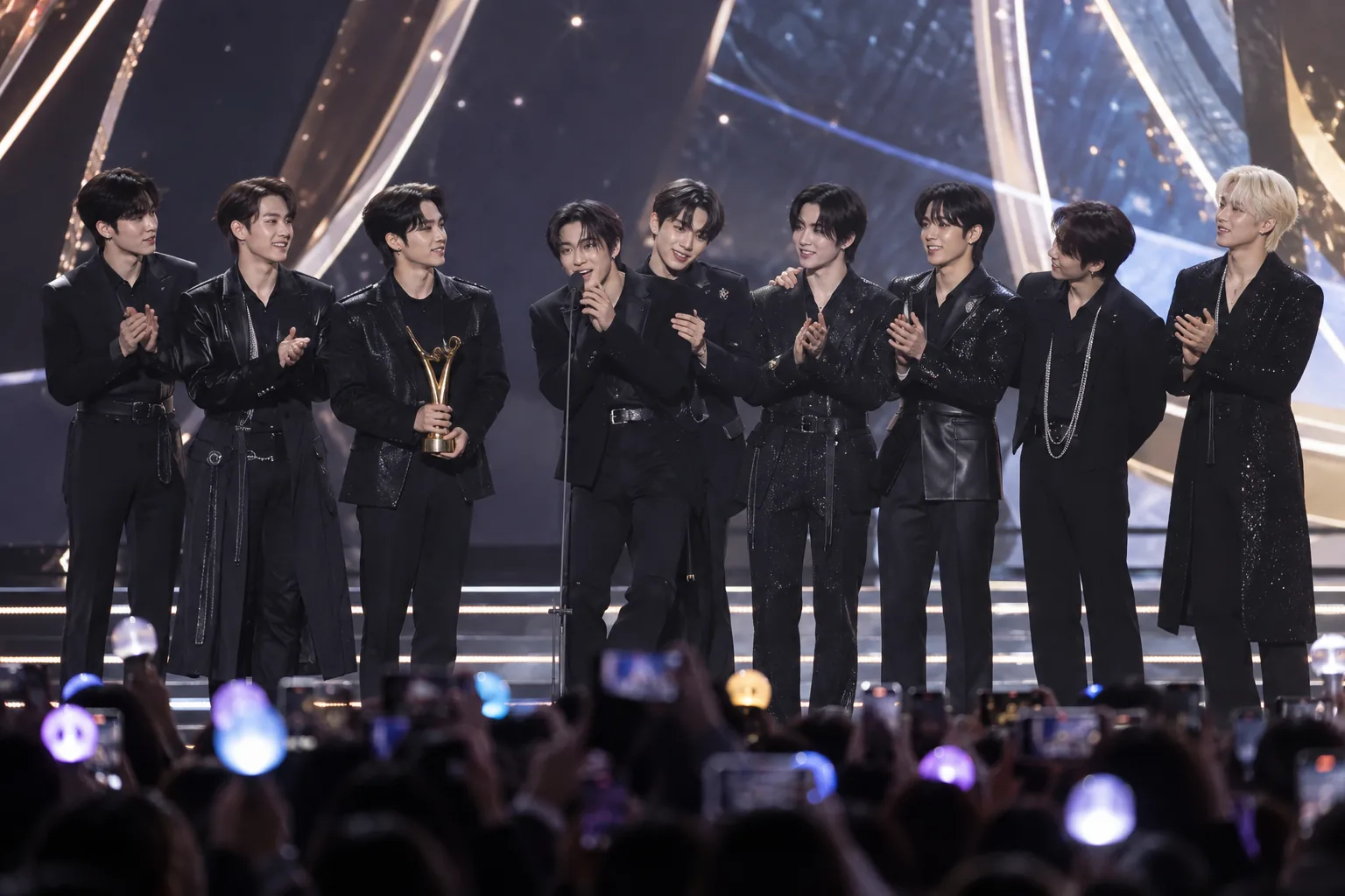 K-pop artists and audience celebrating multiple award categories in Busan